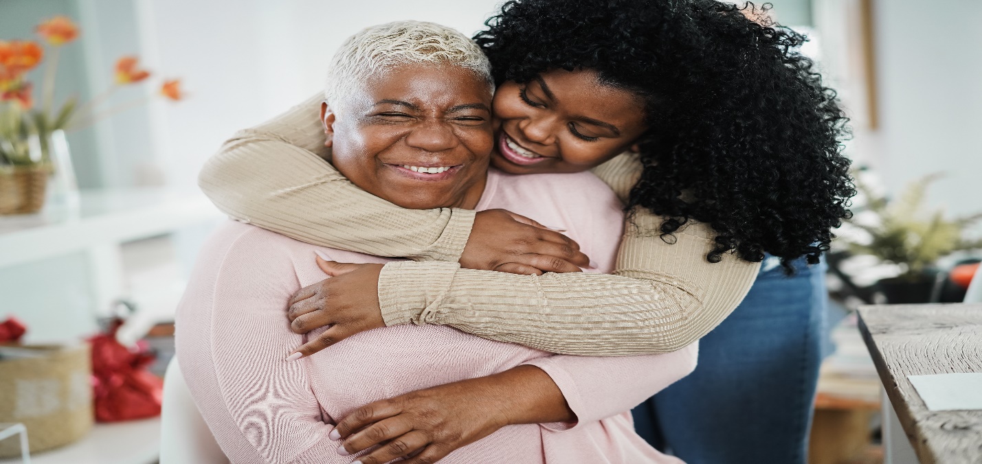 Two women hugging